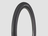 Bontrager GR0 Comp gravel tire in black, 650b x 50mm, tubeless-ready, mounted on a bicycle wheel for gravel riding.