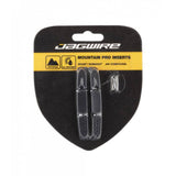 Jagwire Mountain Pro Insert Brake Pads in black for dry conditions, designed for mountain bike braking components.