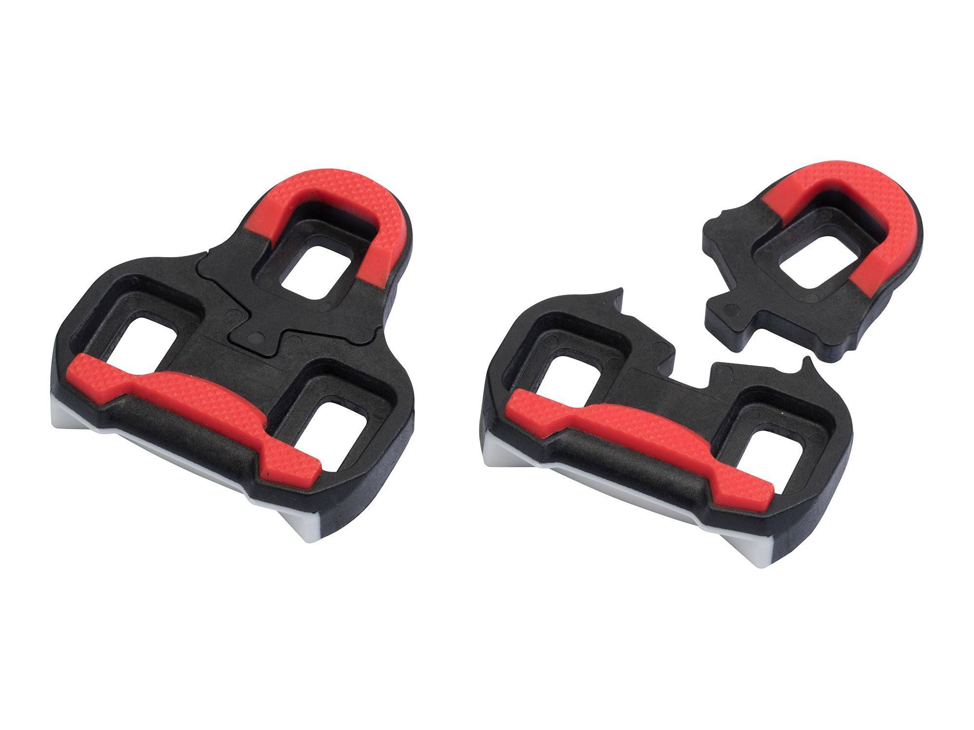 Giant pedal cleats with 9° float compatible with Giant and Look road pedal systems, shown attached to cycling shoes.