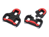 Giant pedal cleats with 9° float compatible with Giant and Look road pedal systems, shown attached to cycling shoes.
