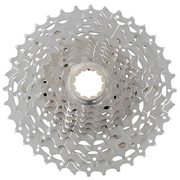 Shimano Deore XT CS-M771 10-speed MTB cassette with Hyperglide for smooth shifting, mounted on a bicycle drivetrain component.