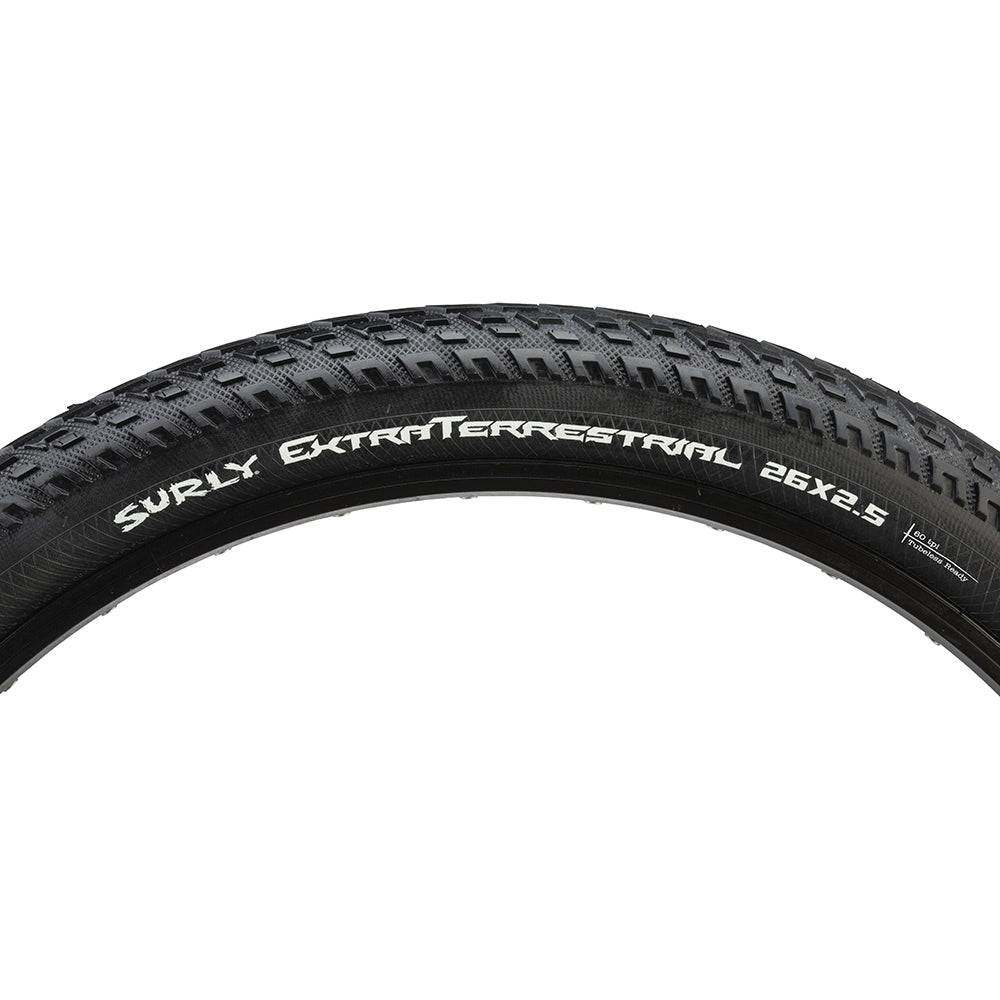 Surly ExtraTerrestrial 26-inch tubeless-ready mountain bike tire with knobby tread for hardpack and touring terrain.
