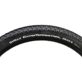 Surly ExtraTerrestrial 26-inch tubeless-ready mountain bike tire with knobby tread for hardpack and touring terrain.