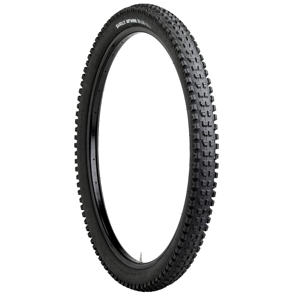 Surly Dirt Wizard 29x2.6 inch MTB tire for off-road trails, showing rugged tread and tubeless-ready design.