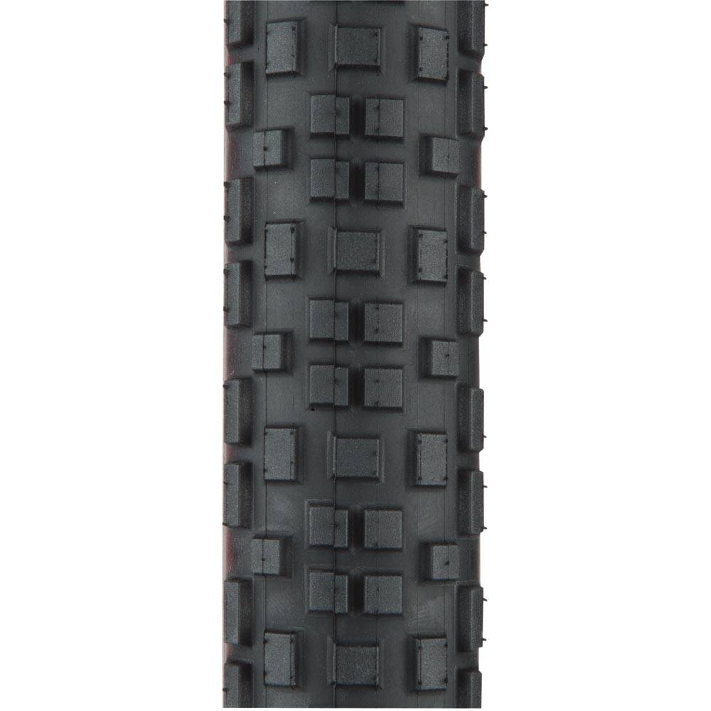 Surly Knard 650x41c tubeless ready tire with textured tread for versatile terrain riding on a bicycle wheel.