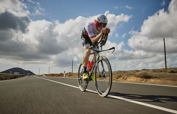 Vittoria Corsa Speed G2.0 700x23c tubeless-ready black road tire shown on a bicycle wheel.