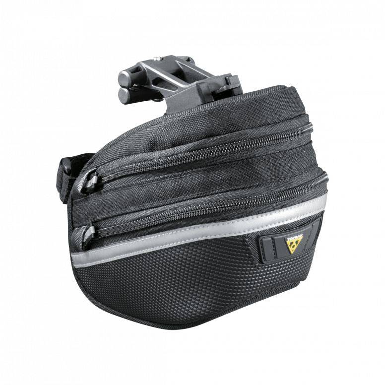 Topeak Wedge II Black micro bike seat pack with quick release mount and reflective strips attached to a bike saddle