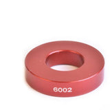 Workshop tool by Wheels Manufacturing for installing 6002 bearings and 15mm axles, part of the Drift Over Axle Kit.