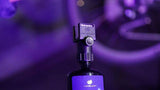 Finish Line Halo Wax bicycle chain lubricant with Smart Luber in a workshop setting, designed for drivetrain performance.