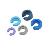 Fox Float DPX2 ½ Shaft Air Spring Volume Tuning Kit components for mountain bike suspension, showing various spare parts.
