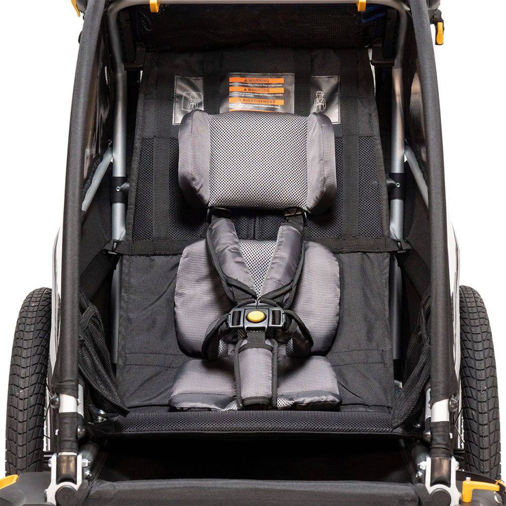 Burley premium seat pad for child trailers, cushioned comfort with adjustable headrest, designed for 2016+ models.