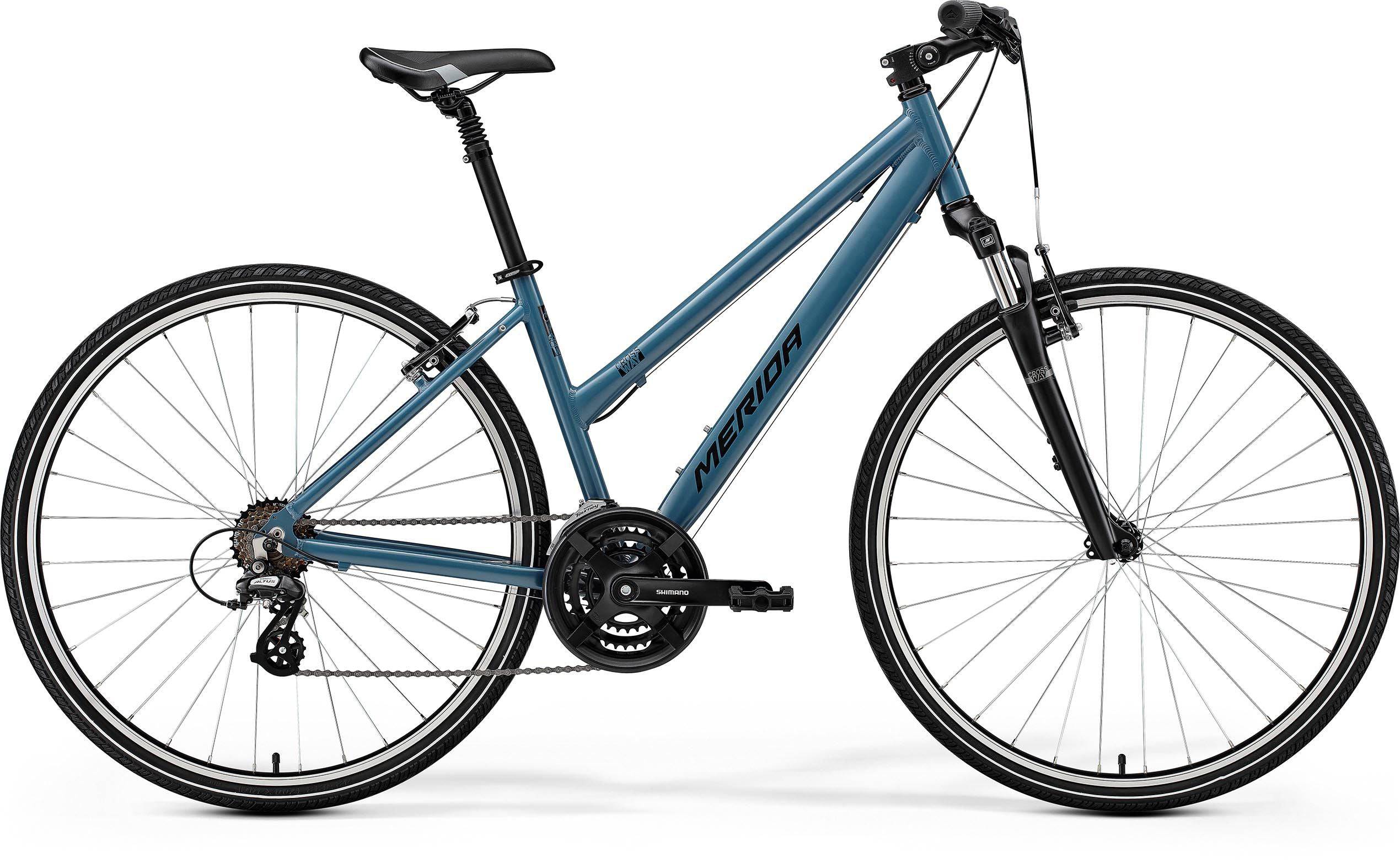 Merida Crossway 10-V women's hybrid bike with Shimano Acera gears and disc brakes, featuring a sleek frame and ergonomic handlebars.