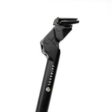 Redshift Sports ShockStop suspension seatpost for gravel, road, and e-bikes, showing the adjustable suspension mechanism.