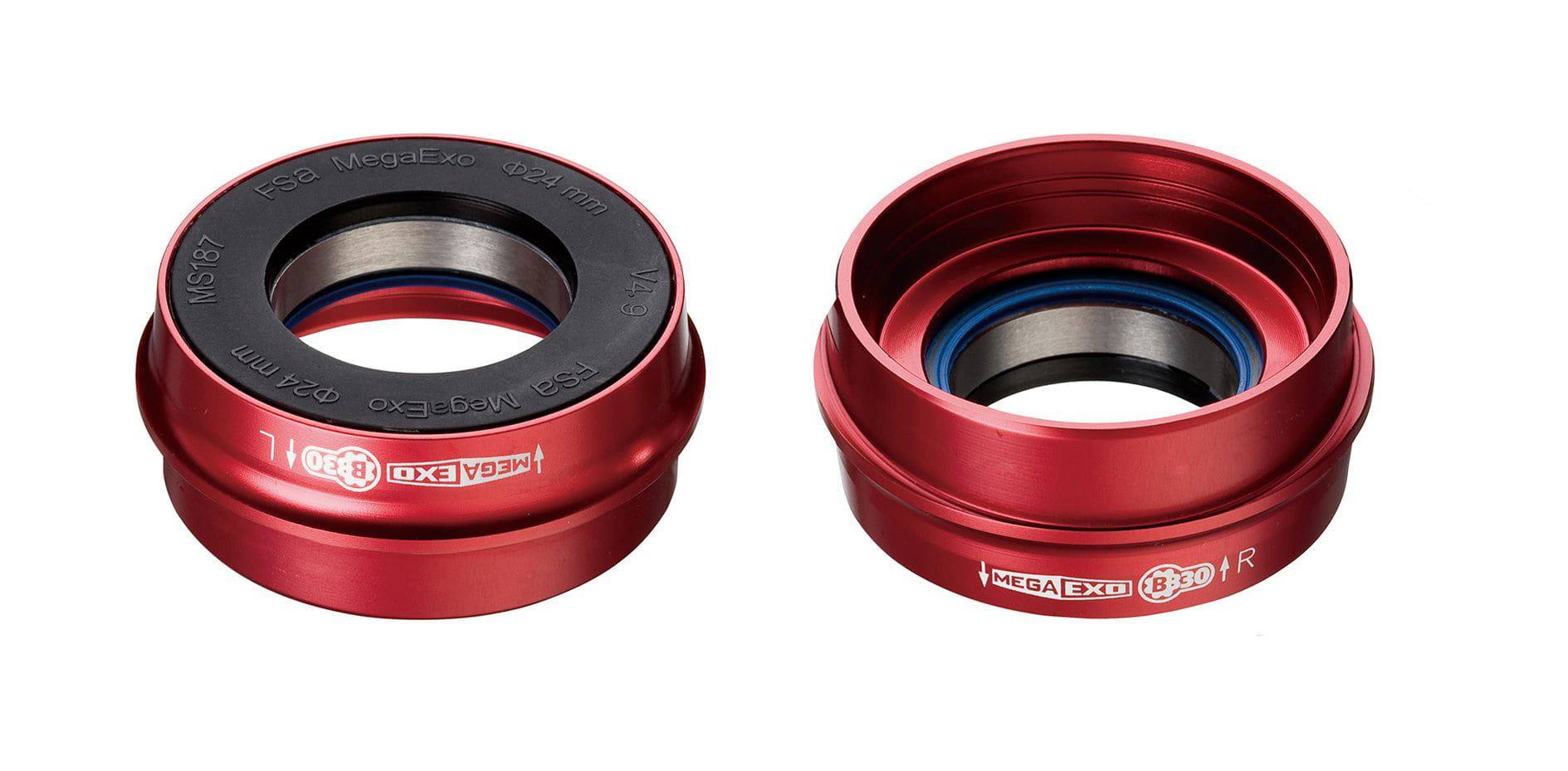 FSA K-Force Light MegaExo road bike bottom bracket adapter for BB30 frames, shown in black with metal components.