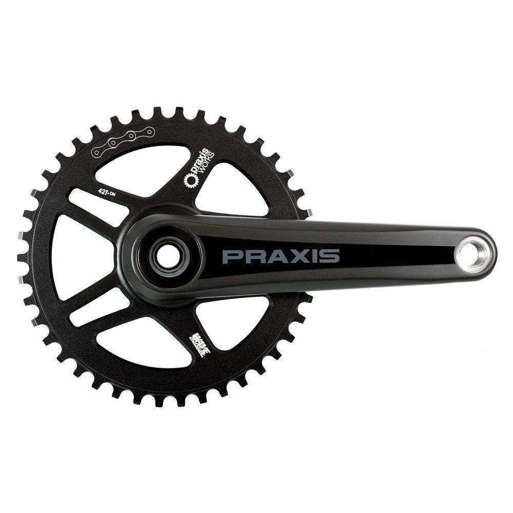 Praxis Works carbon crank boots spare for Zayante, Lyft, Bosch, and Yamaha mountain bike cranks on a clean background.
