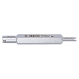 UNIOR workshop valve core remover tool with hex grip for Schrader and Presta valves, shown on a workbench.
