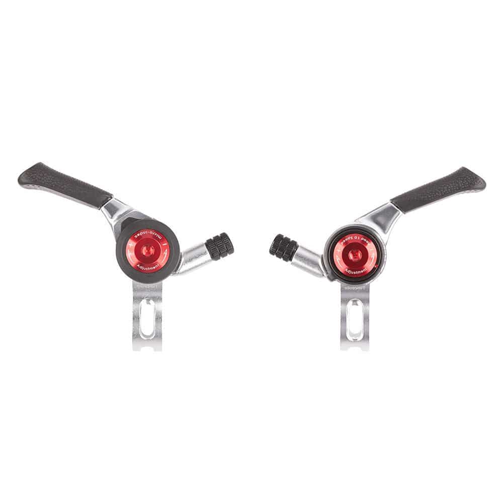 MicroSHIFT thumb shifters for Shimano road bikes, showing ergonomic design and gear control components on the handlebar.