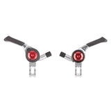 MicroSHIFT thumb shifters for Shimano road bikes, showing ergonomic design and gear control components on the handlebar.