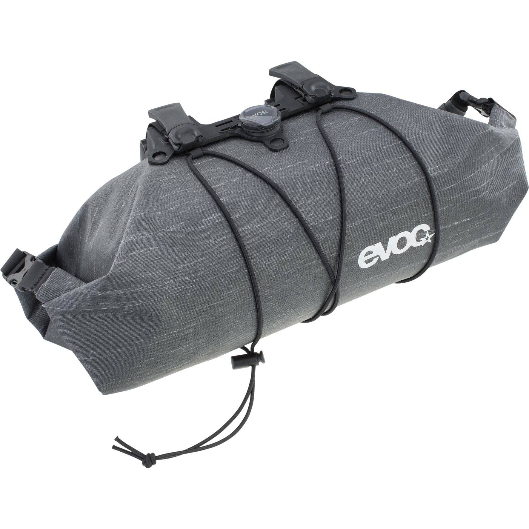 EVOC Handlebar Pack BOA WP 5L waterproof bike pannier with secure fit system mounted on bike handlebar.