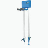 Park Tool THS-1.2 Trailhead Workstation outdoor bike repair station with tools, mounted on a workshop setup.