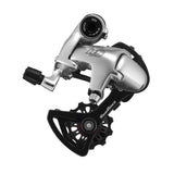 SunRace RDRS SD 10-speed road bike rear derailleur with short cage, mounted on a bike drivetrain for smooth shifting.