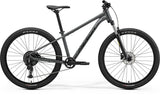 Merida Big Seven 20 MY26 hardtail mountain bike with modern geometry and durable frame, shown in a riding position with off-road setting.