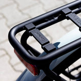 Urban Iki TA-KE MIK HD rear child bike seat with MIK HD system and Click & Go attachment, shown mounted on a bicycle.