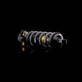 Cane Creek DBcoil IL G2 trunnion rear shock with 4-way damping and climb switch, showing the shock's body and adjustment controls.