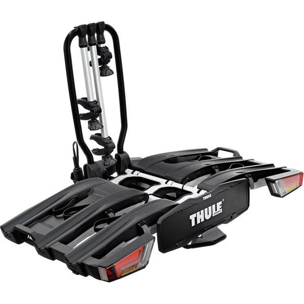 Thule EasyFold XT 3-Bike towball carrier with AcuTight torque knobs and 13-pin connector, designed for secure bike transportation.