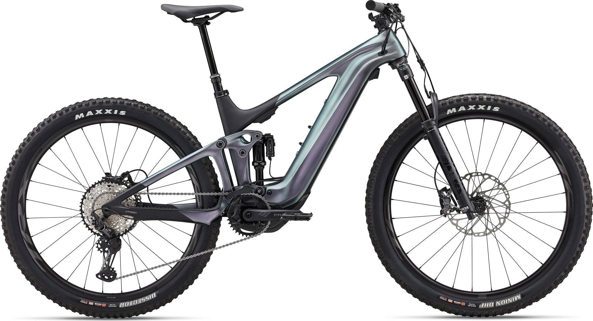 Giant Trance X Advanced E+ 1 e-MTB bike with adjustable geometry and SyncDrive Pro motor, shown outdoors on a trail.