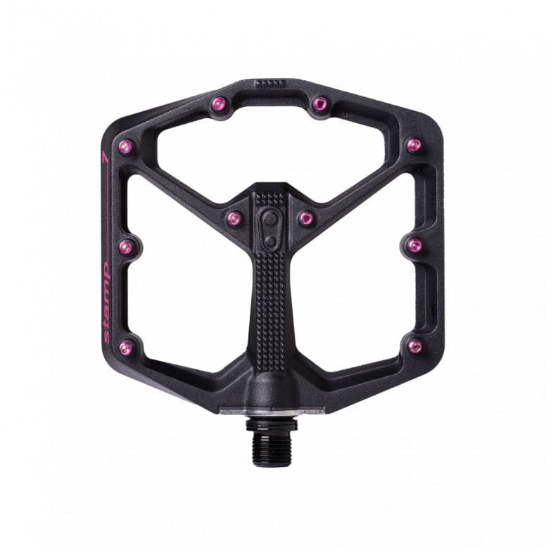 Crank Brothers Stamp 7 black and pink flat MTB pedal with adjustable pins, durable component for mountain biking.