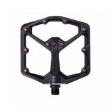 Crank Brothers Stamp 7 black and pink flat MTB pedal with adjustable pins, durable component for mountain biking.