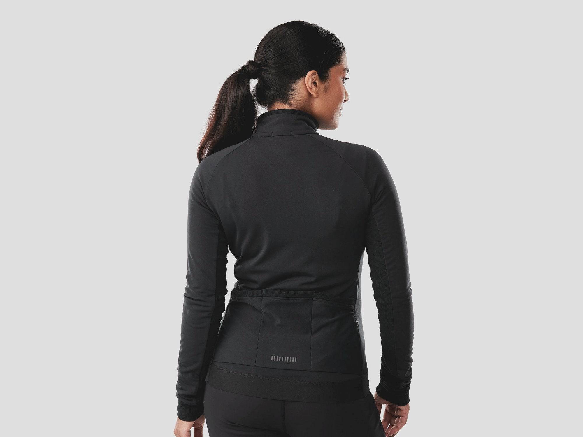 Trek Circuit Women's thermal long sleeve cycling jersey for cool weather rides, featuring lightweight fabric and moisture-wicking design.