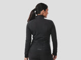 Trek Circuit Women's thermal long sleeve cycling jersey for cool weather rides, featuring lightweight fabric and moisture-wicking design.