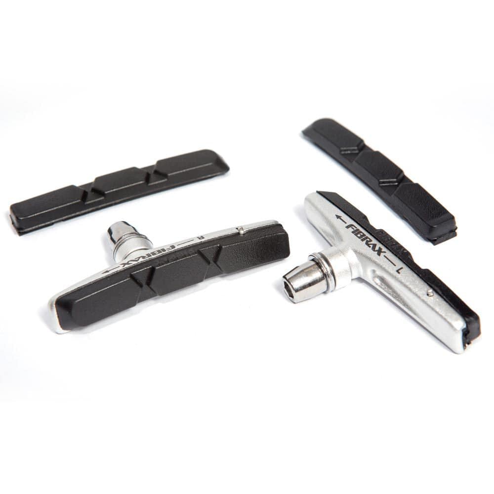 Fibrax SH-750 brake pads with alloy shoes and spare inserts for reliable bike braking, shown with metal components and inserts.