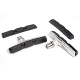 Fibrax SH-750 brake pads with alloy shoes and spare inserts for reliable bike braking, shown with metal components and packaging.