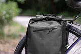 Madison Bags Roam 30L waterproof pannier bag with quick-release mounting system, designed for cycling accessories.