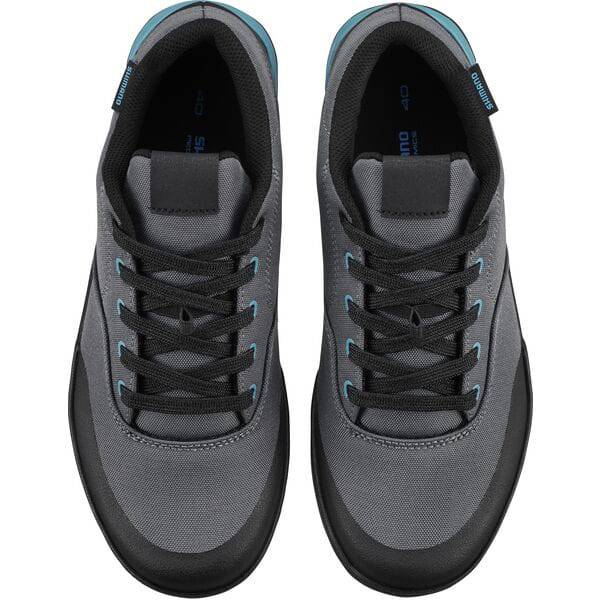 Shimano GF4W women's gravel cycling shoes with ULTREAD grip and flat pedal compatible sole, designed for comfortable outdoor riding.