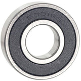 M Part 6001 2RS cartridge bearing for bicycle hubs and wheels, shown in close-up with metal casing and rubber seals.