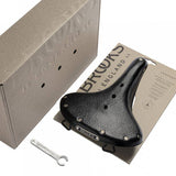 Brooks B68 leather city bike saddle with rear bag loops, designed for comfort and vintage-style cycling components.