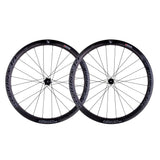 Reynolds QL-Y2LR 135x12mm rear hub end cap for secure wheel fit, shown in close-up image of bicycle component.