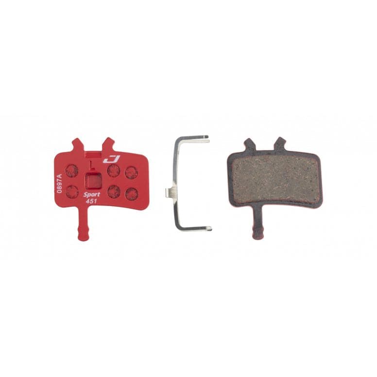 Jagwire Sport semi-metallic disc brake pads for Avid BB7 and Juicy mountain bike brakes, showing the pad material and design details.