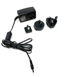 Elite 1.5A power supply for UK, Japan, Australia, and US compatible Elite trainers, shown with connected power cord.