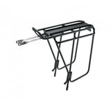 Topeak Super Tourist DX black rear bike rack mounted on touring bike with panniers, suitable for 26-inch and 700C wheels