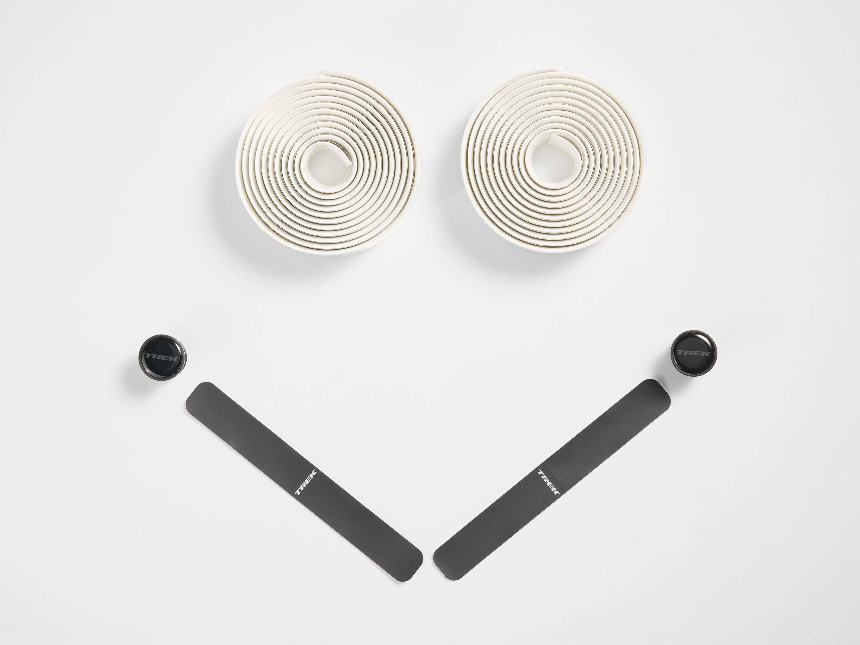Trek Double Gel Cork Handlebar Tape set with black and gray design, shock-absorbing and comfortable for bike handlebars.