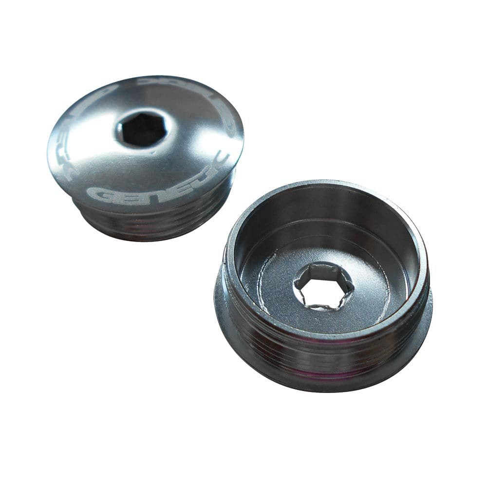 Genetic Heritage crank caps and bike axle protection components, spare parts for bike maintenance and axle security.