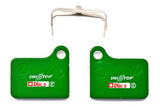 SwissStop Disc 5 Organic brake pads for Shimano Deore BR-M555, green pair, bicycle disc brake components.