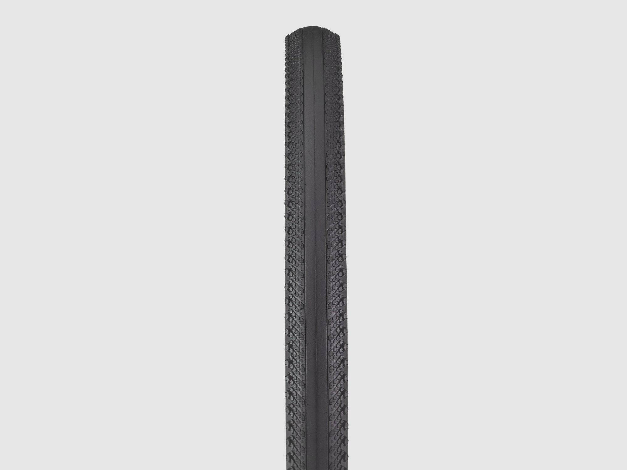 Bontrager GR0 Comp gravel tire, 650b x 50mm, black, tubeless-ready, mounted on a bike wheel, suitable for gravel cycling.