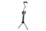 Topeak Flashstand RX folding bike stand for road bikes, black and silver, supporting 700 x 38C tires on a road bicycle.