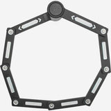 Kryptonite Keeper Mini folding bike lock with 80cm length, carry bracket, and keys, shown in a compact, portable design.
